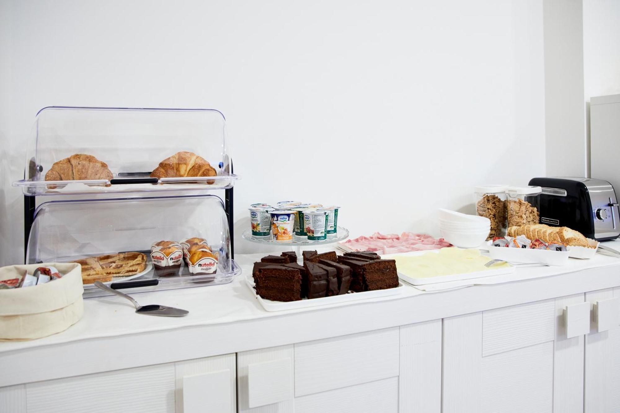 Le Vette Room&Breakfast Роверето Стая снимка